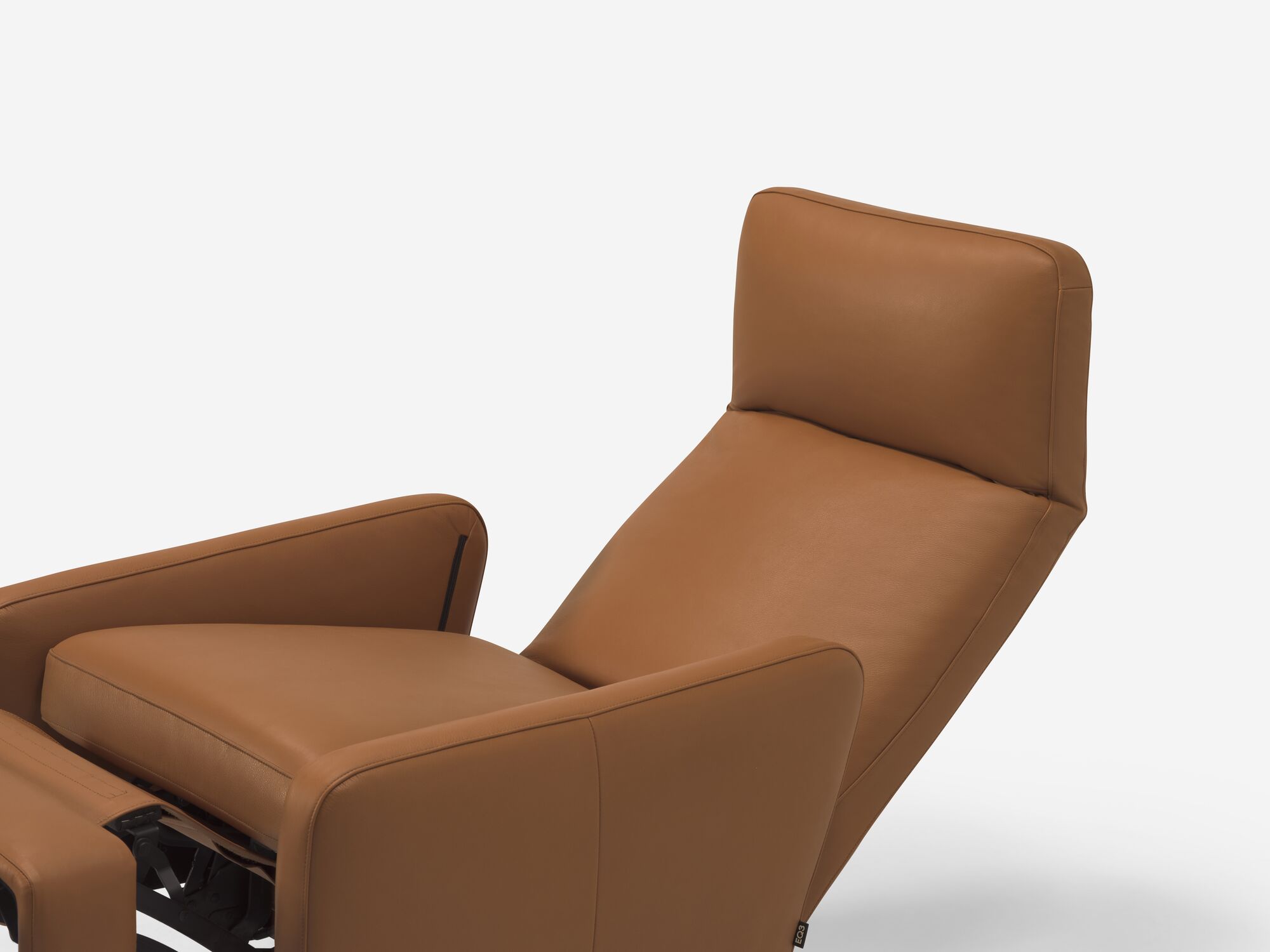 Front angle detail view of brown leather reclining chair with seat reclined